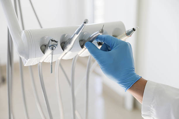 Professional Tooth Extraction technician working in Bensley, VA